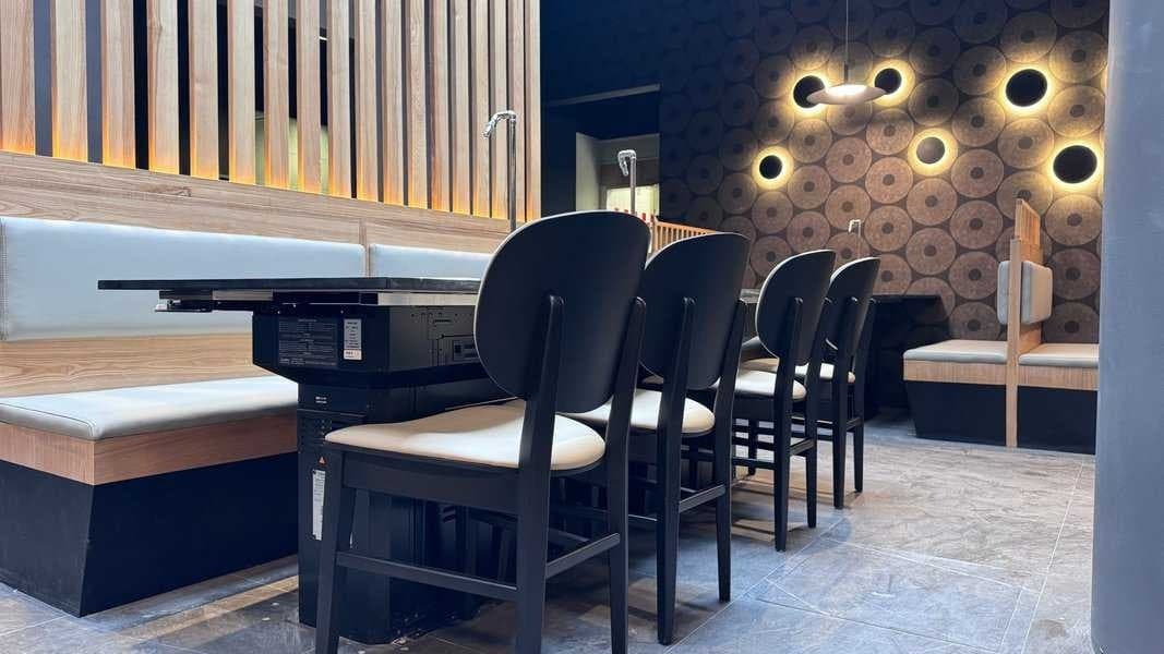 Table equipment, exhaust strategy, furniture layout and server access should be checked together before a restaurant renovation budget is locked.